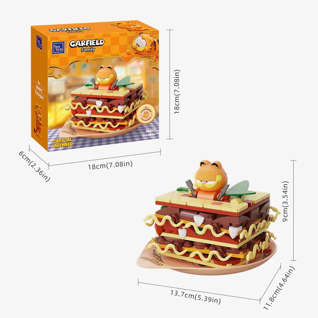 a toy called the "Garfield Family" made of Legos. The toy is a 3D model of a sandwich, with various layers of bread, cheese, and other toppings. The toy is displayed in two different sizes, with the larger version being a full-sized Lego model and the smaller version being a smaller Lego model. The toy is packaged in a box, and the dimensions of the toy are provided.