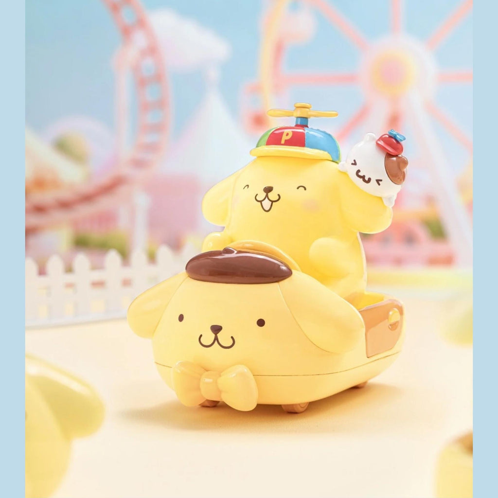 A yellow toy car with a smiling face and a small dog on top, set against a colorful background with a ferris wheel and other amusement park rides.