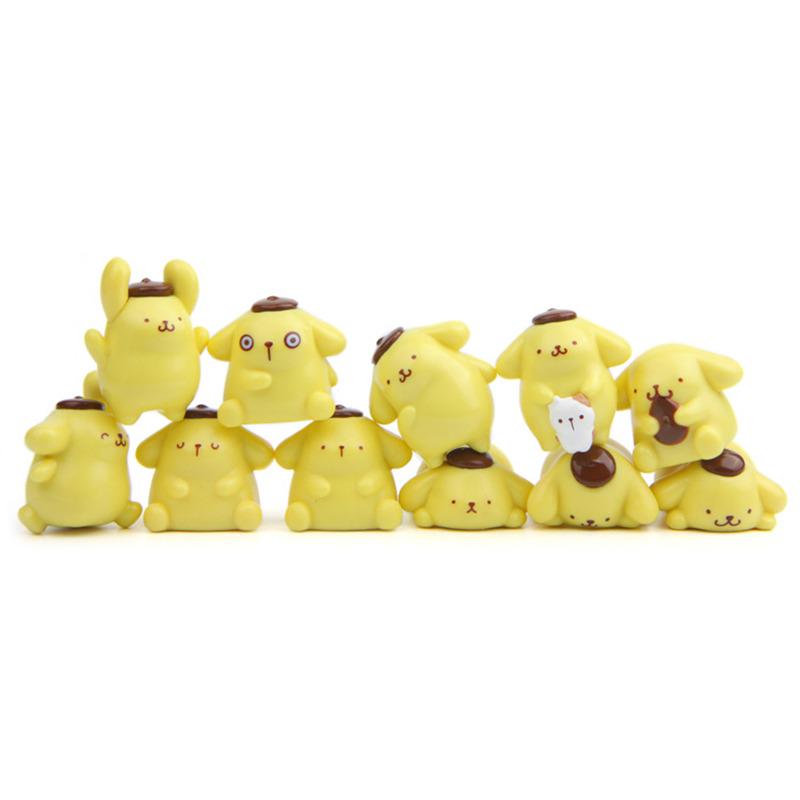 A collection of yellow cartoon animal figurines, including dogs and cats, arranged in a row.