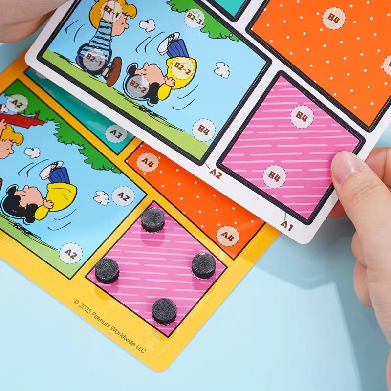 a person's hands holding a colorful game board with cartoon characters and various game pieces.
