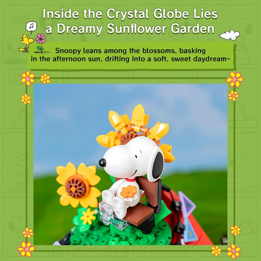 A figurine of Snoopy, a beloved character from the Peanuts comic strip, is depicted in a whimsical garden scene. The figurine is surrounded by a variety of flowers, including sunflowers, and is sitting on a bench. The image is framed by a green border with yellow flowers, creating a cheerful and playful atmosphere.