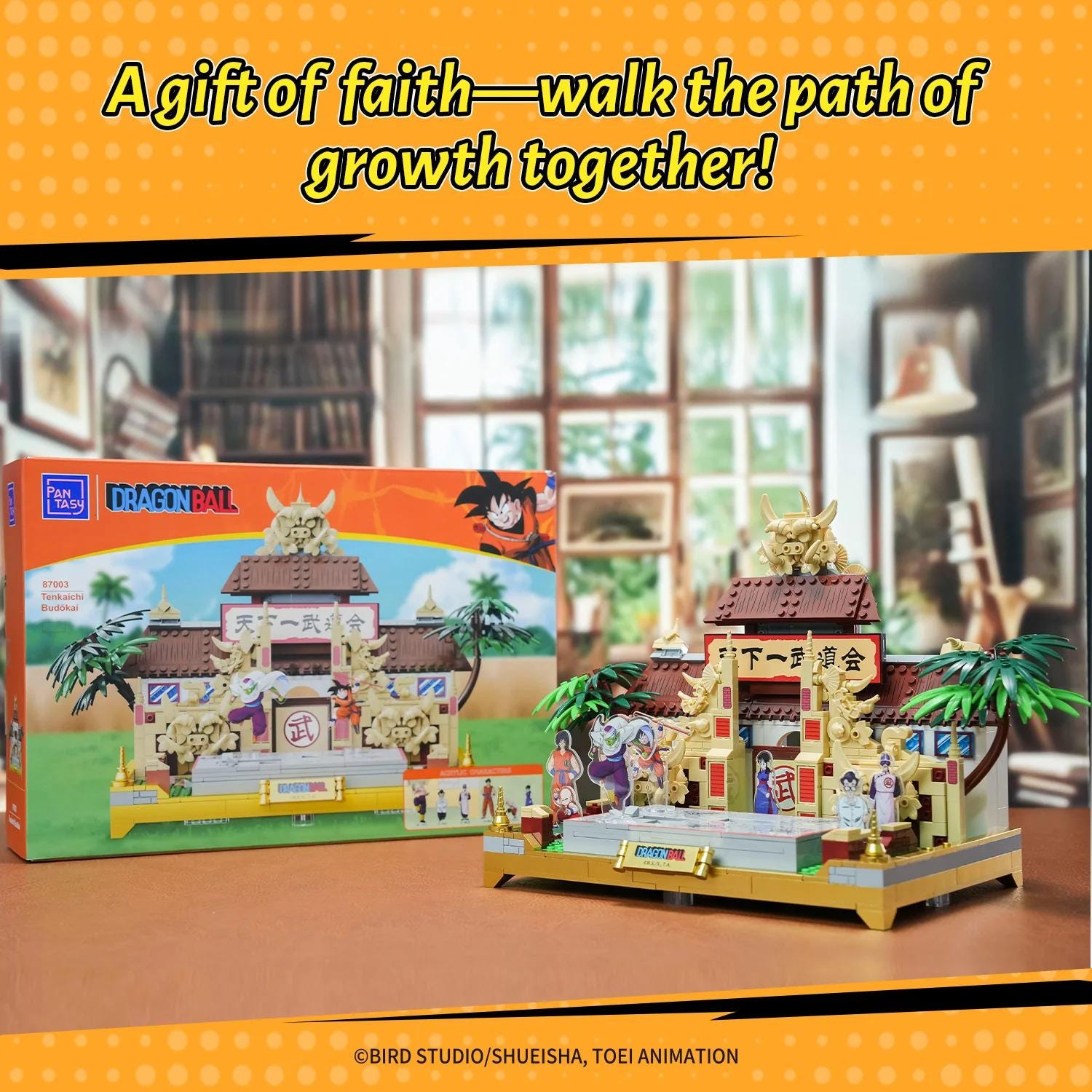 a LEGO set of a temple with a dragon and a person, along with the packaging for the set.