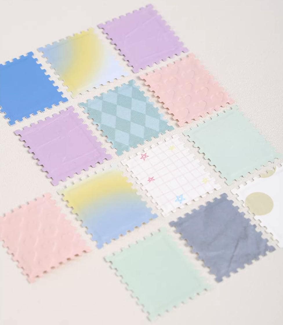a collection of colorful, square-shaped pieces arranged in a grid-like pattern on a light background.