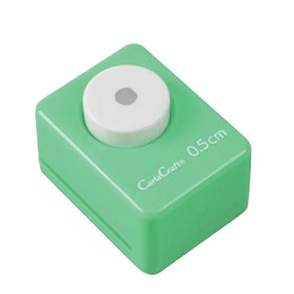 A green push button device with a white circular button on top.