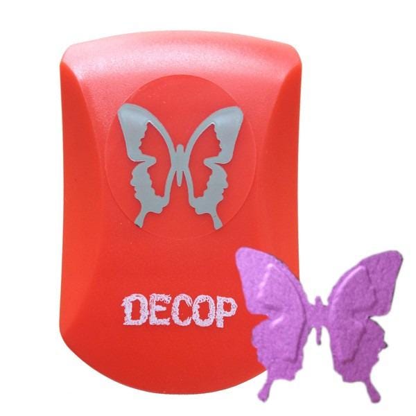 a red plastic cutter with a silver butterfly design on it, and a purple butterfly-shaped object next to it.