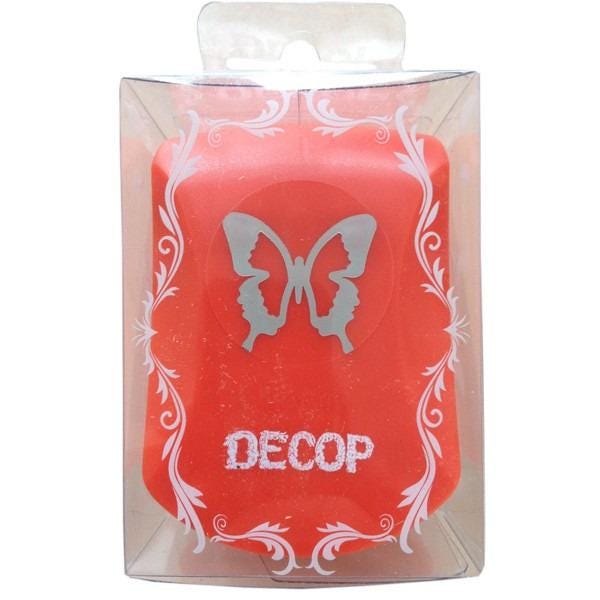A red object with a silver butterfly design on it, and the word "DECOP" written on it.