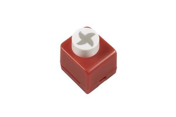 A red plastic object with a white circular button on top, which appears to be a tool or device.