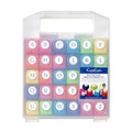 A clear plastic container with a handle, filled with colorful alphabet punch blocks arranged in a grid pattern.