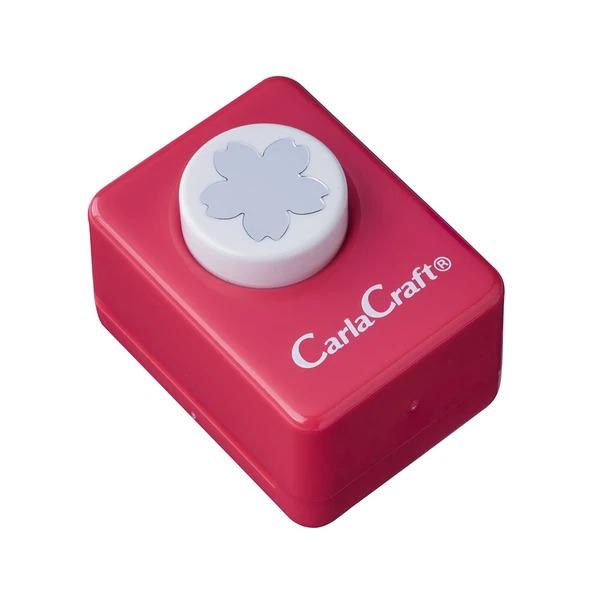 A red plastic tool with a white flower-shaped button on top, labeled "CarlaCraft®".