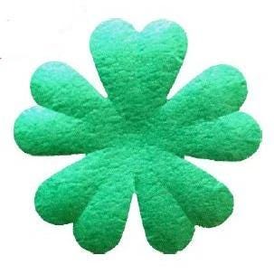 A green, heart-shaped object with a textured surface.