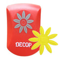 a red object with a white flower design on it, and there is a yellow flower-shaped object next to it.