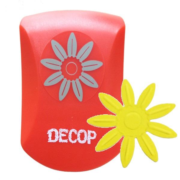 a red object with a white flower design on it, and there is a yellow flower-shaped object next to it.