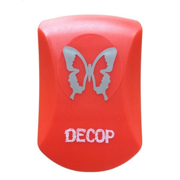 a red object with a silver butterfly design on it, and the word "DECOP" written below it.