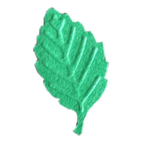 A green felt leaf-shaped object is shown against a white background.