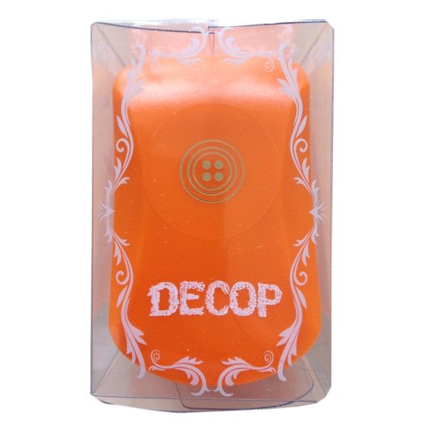 An orange object with a decorative border and the word "DECOP" printed on it.