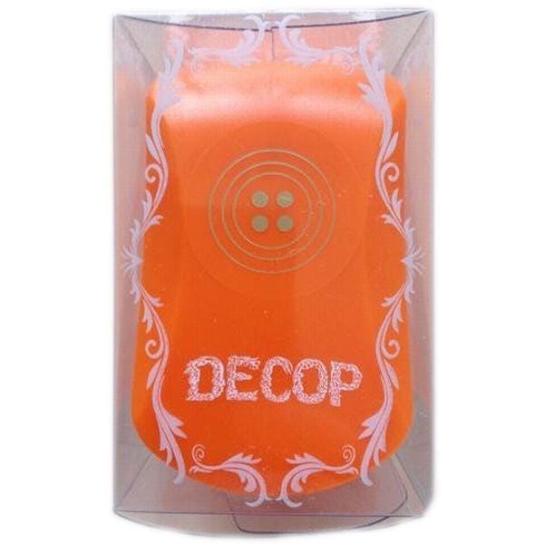 an orange candle with a decorative border and the word "DECOP" written on it.
