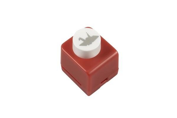 A red and white plastic stamp with a white circular design on top.
