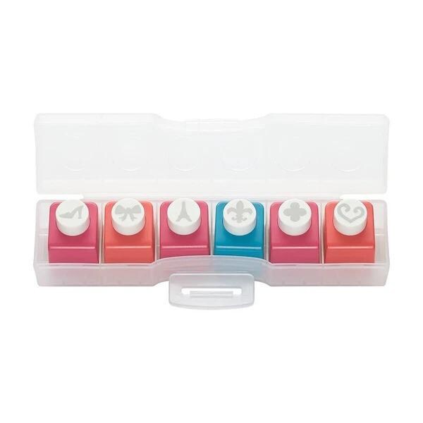 A plastic container with a clear lid, containing six colorful push pins with various designs on them.