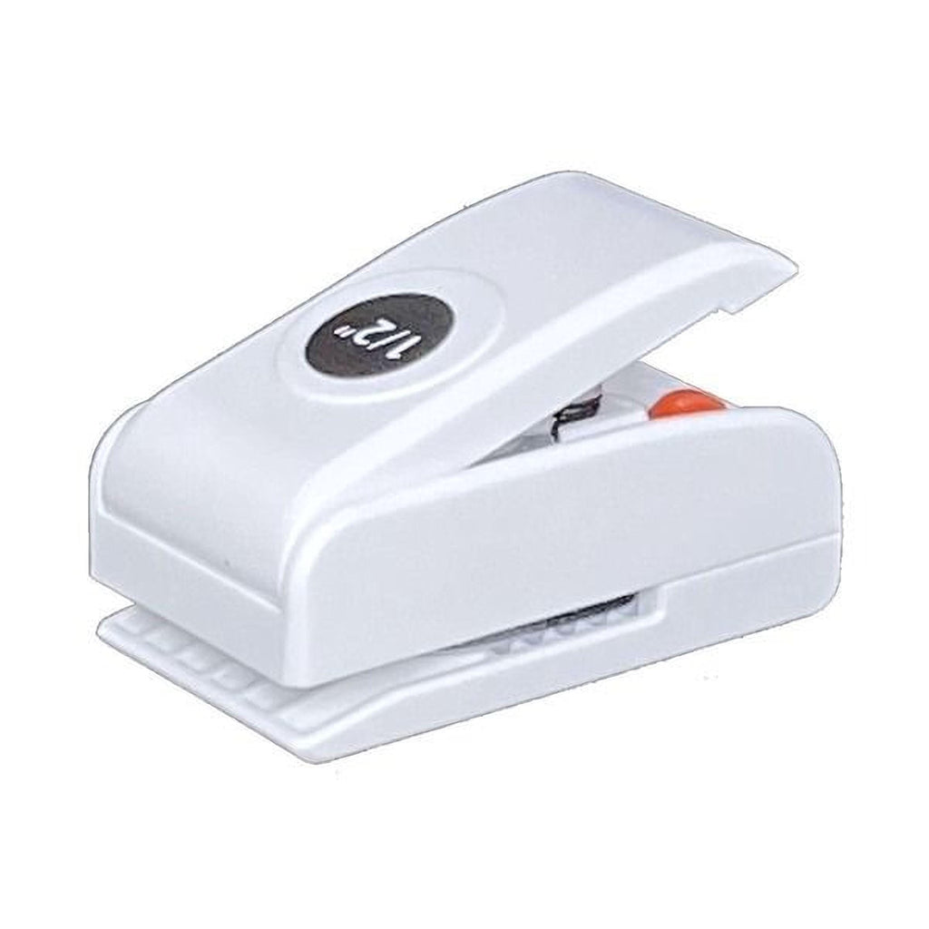 A white plastic hole puncher with a black circular logo on it.