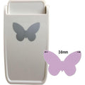 a white plastic object with a silver butterfly design on it, along with a smaller purple butterfly-shaped object next to it.