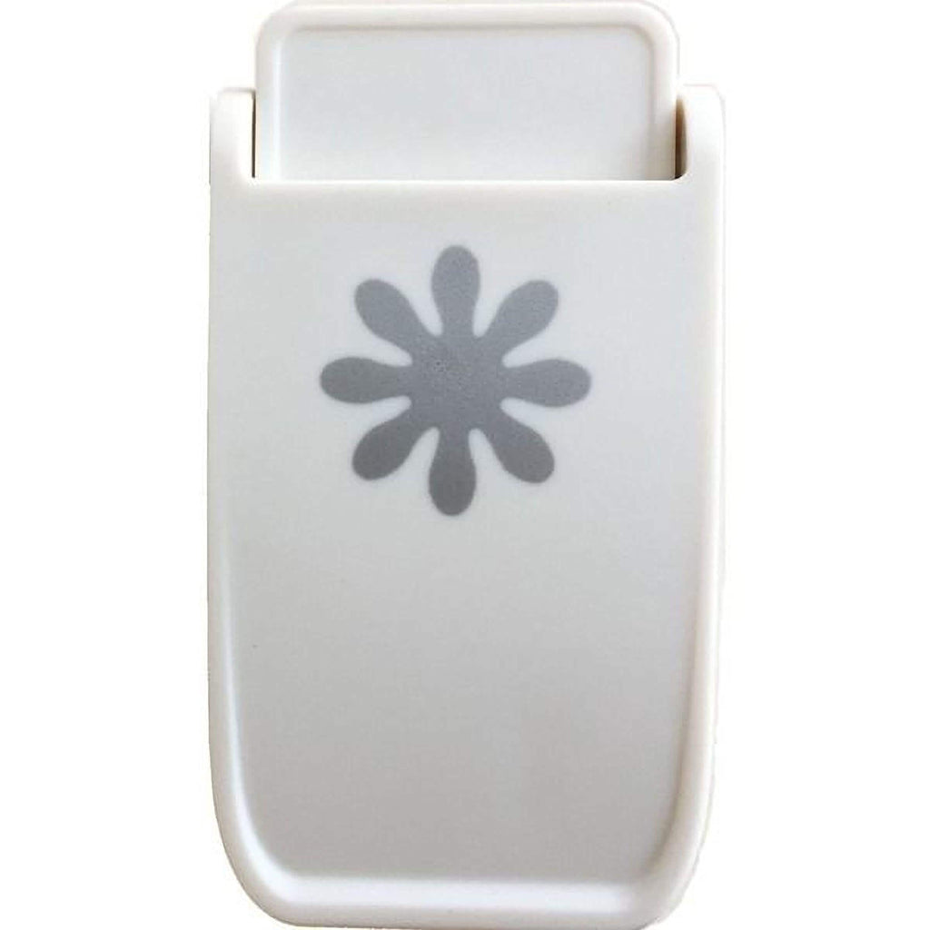 a white plastic object with a gray flower-like design on it.