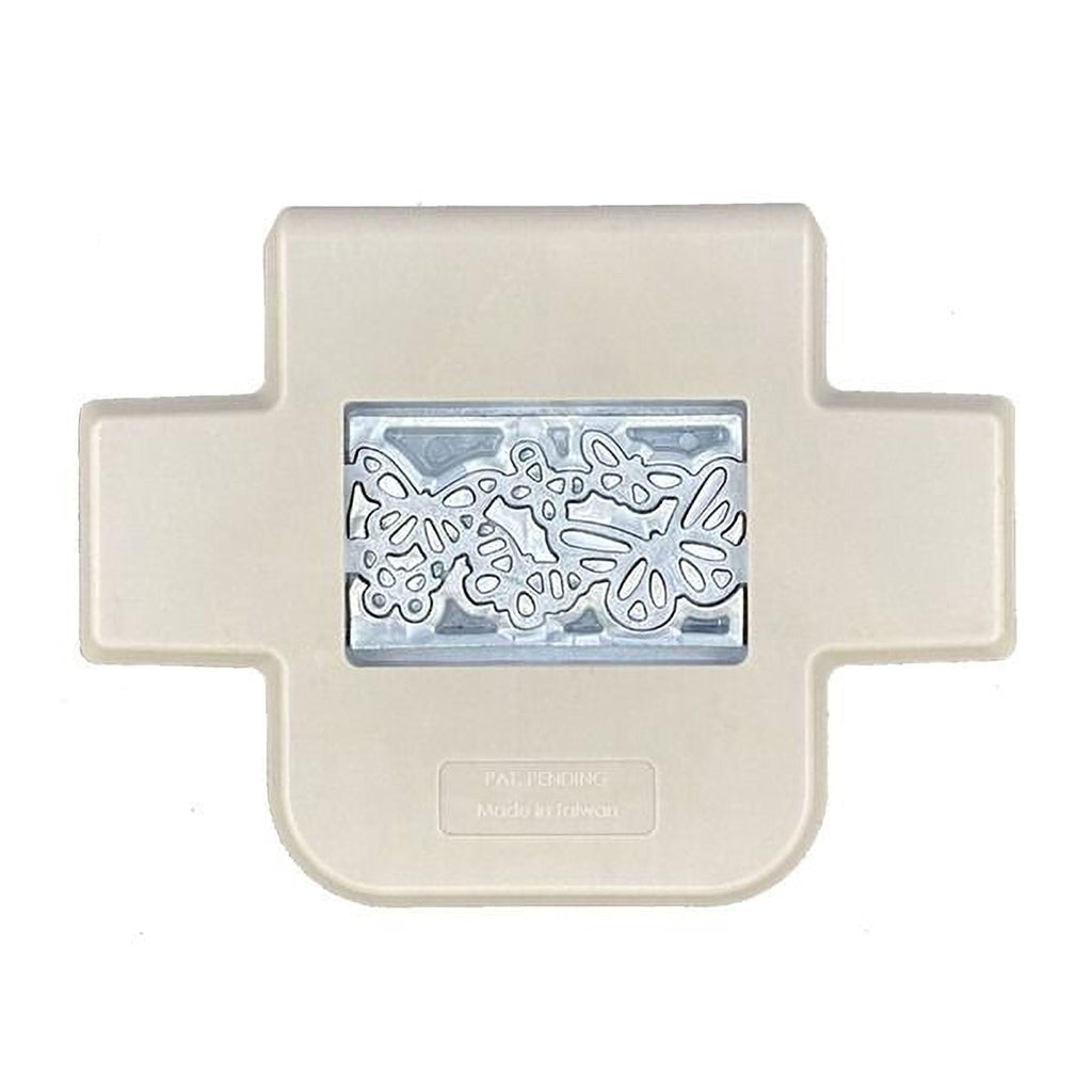 A beige plastic container with a cutout in the center, revealing a silver-colored metal object with a floral pattern.