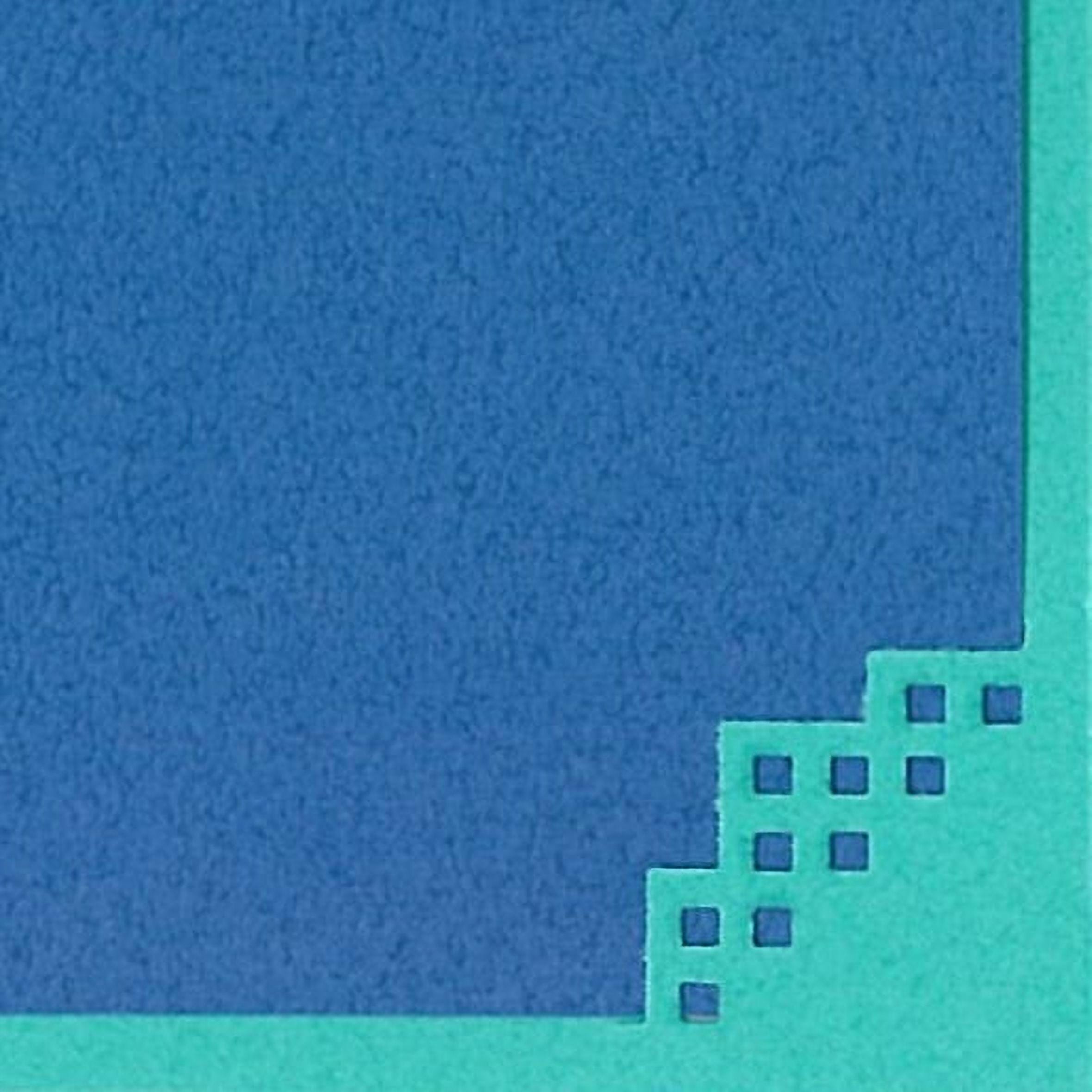 The image is a close-up of a blue and green surface with a geometric pattern of small squares or rectangles.