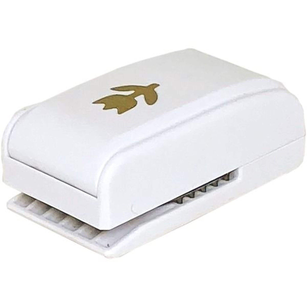 A white, rectangular, and flat-shaped object with a gold bird design on it.