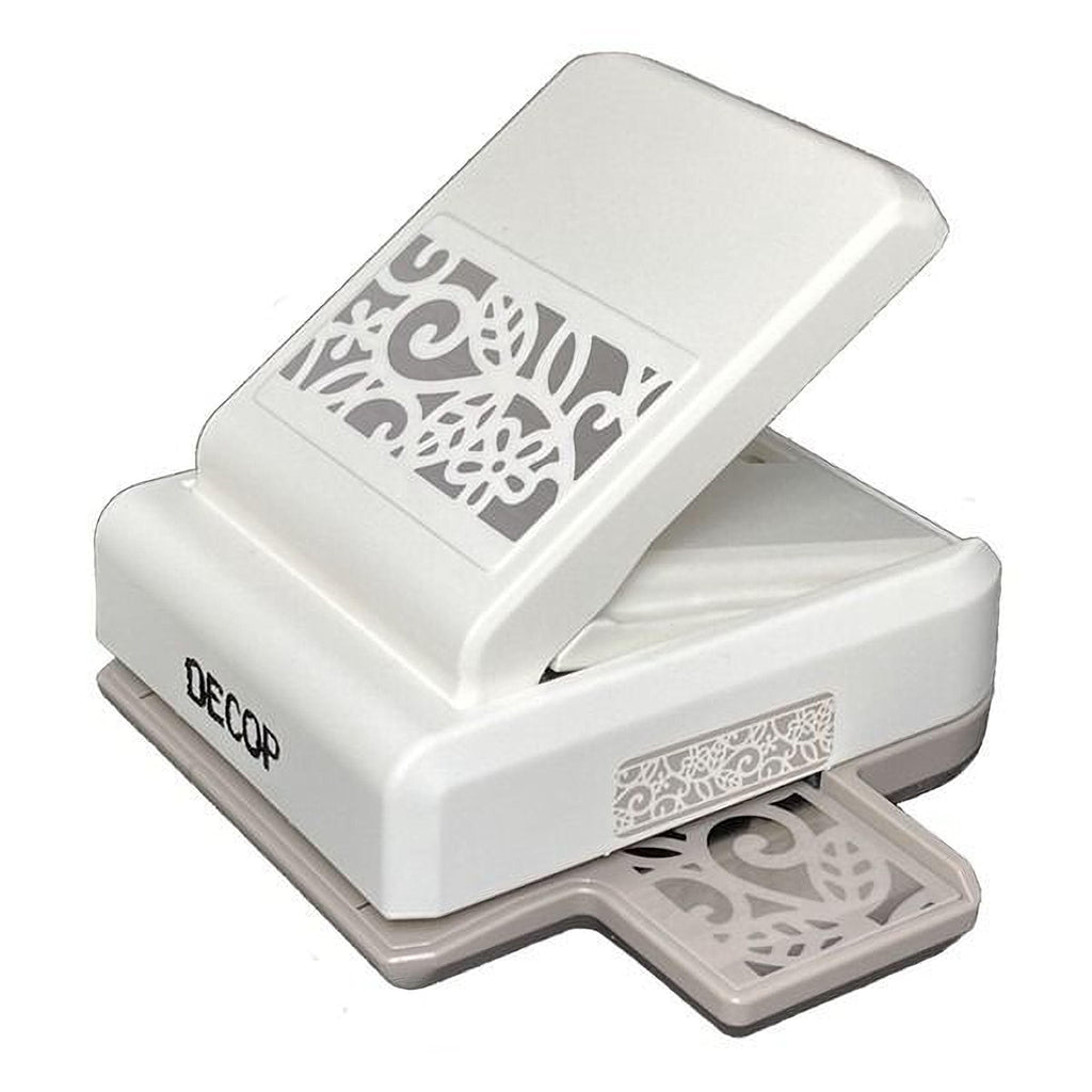 A white and gray decorative punch with a floral pattern on it.