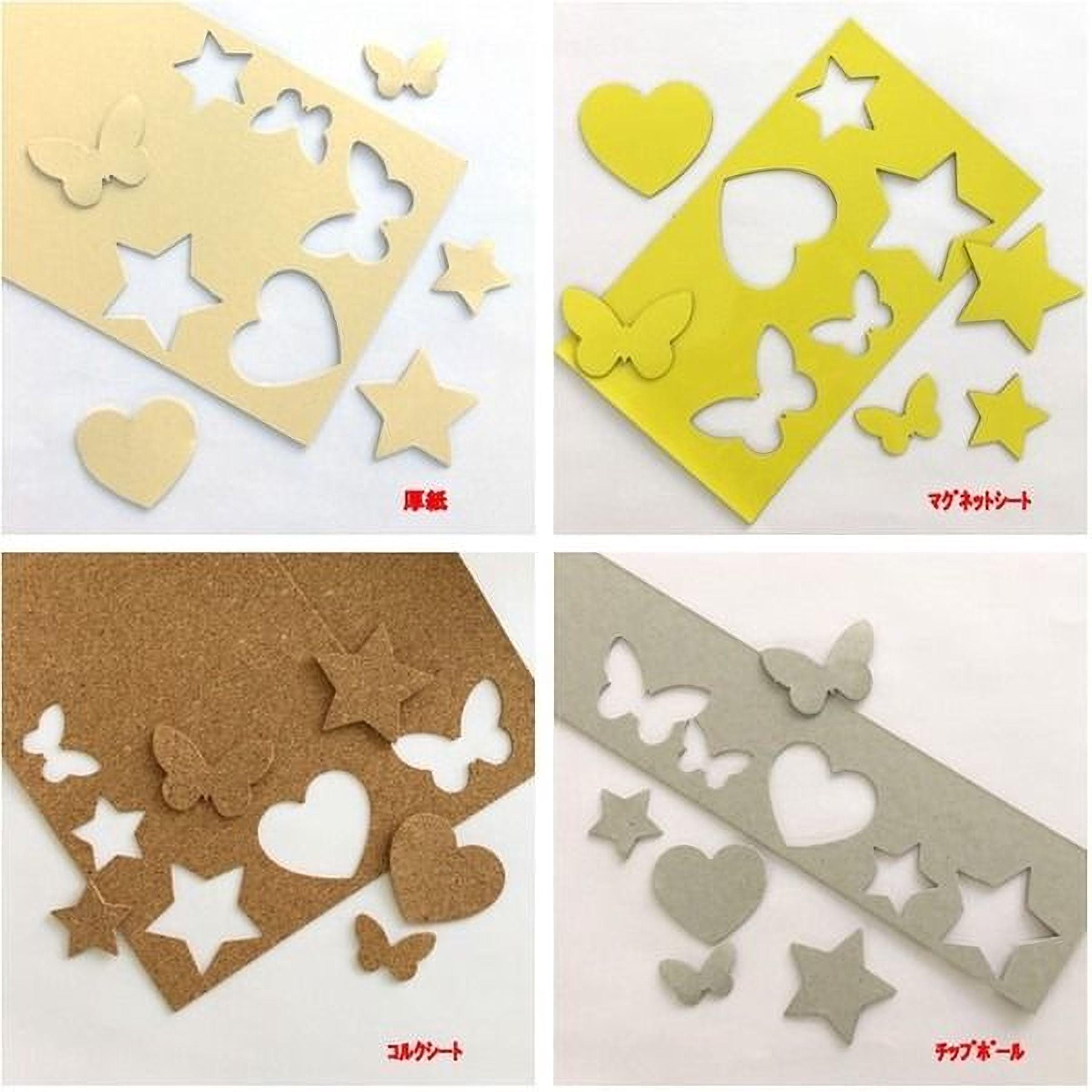 four different cut-out shapes, including stars, hearts, butterflies, and other decorative elements, arranged on a white background.