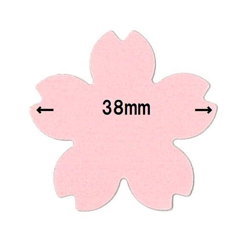 A pink flower-shaped object with the text "38mm" indicating its size.