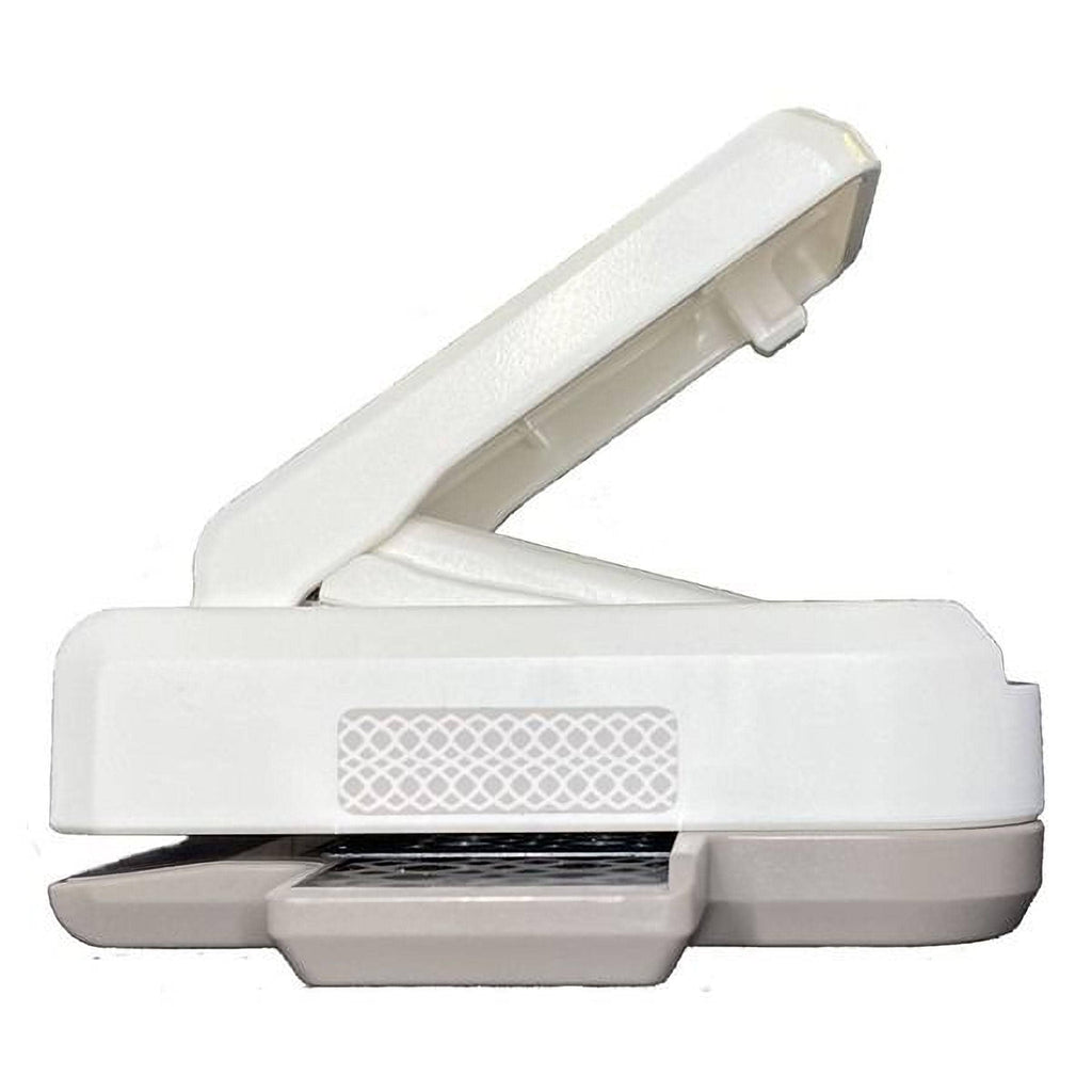 a white and gray electronic device with a white lid, which appears to be a printer or scanner.