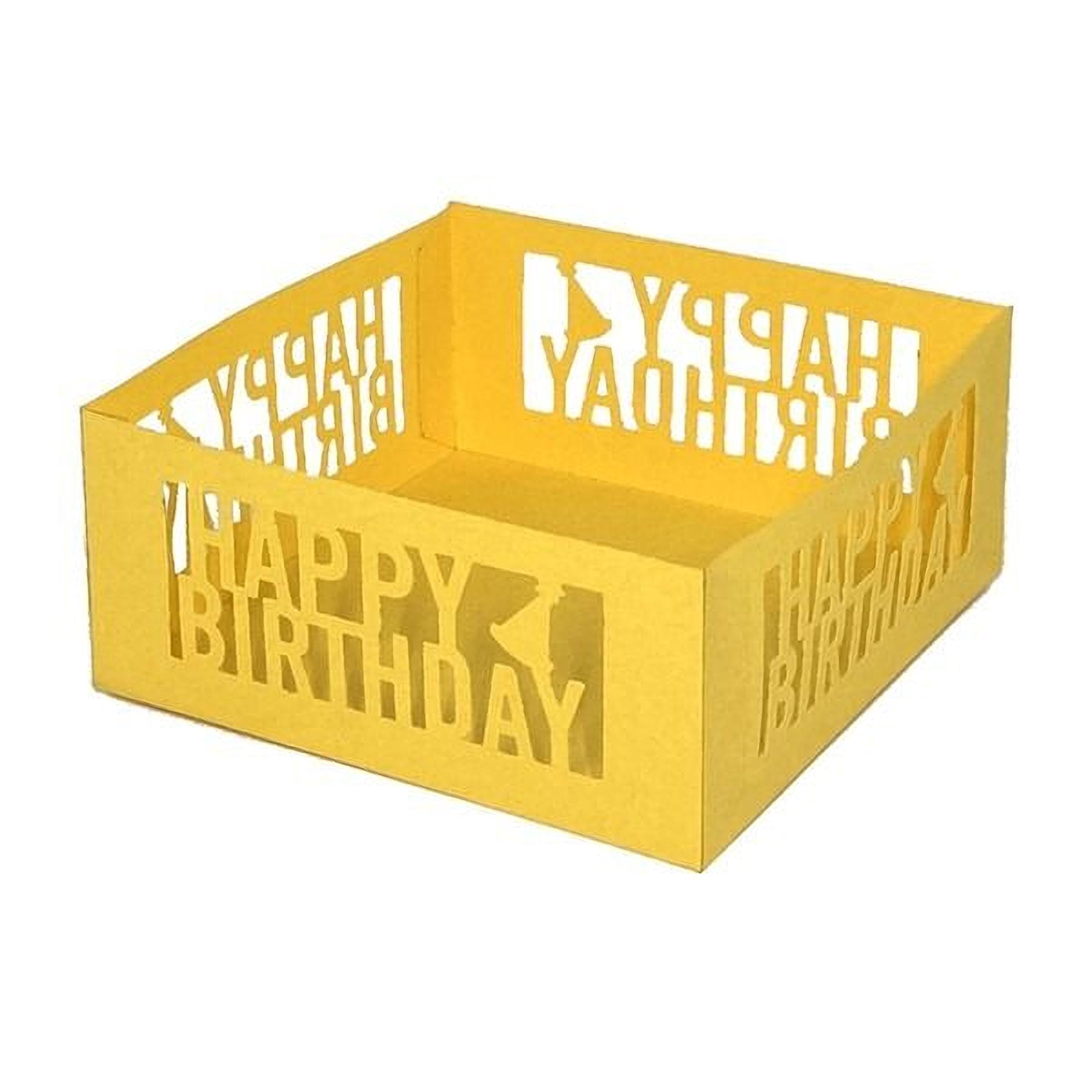 A yellow cardboard box with cut-out text that says "Happy Birthday".