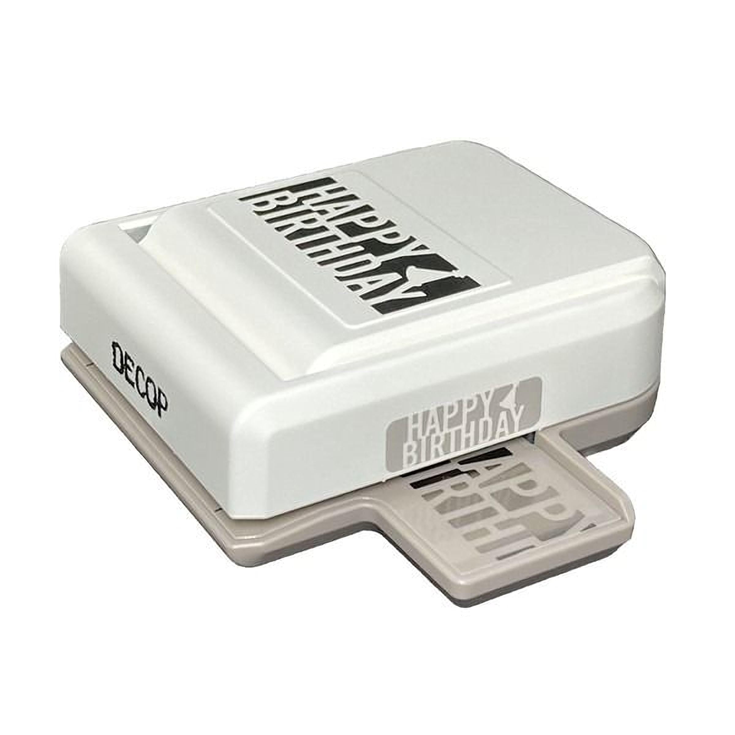 A white and gray paper punch with the text "HAPPY BIRTHDAY" printed on it.