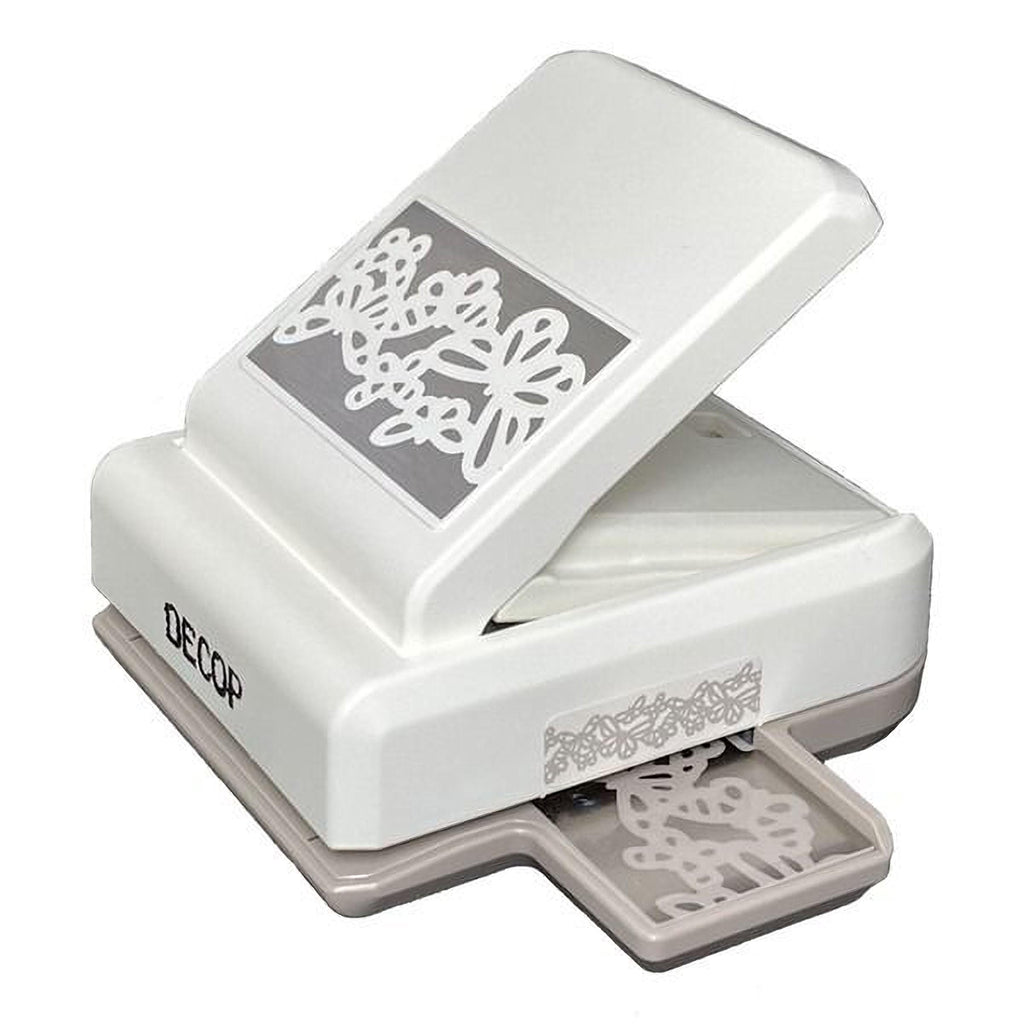 A white and gray decorative punch with a floral design on the front.