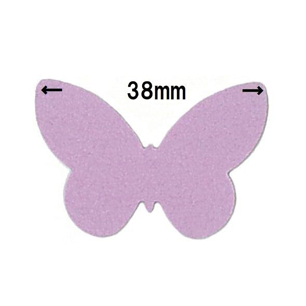 A purple butterfly-shaped object with the text "38mm" indicating its size.