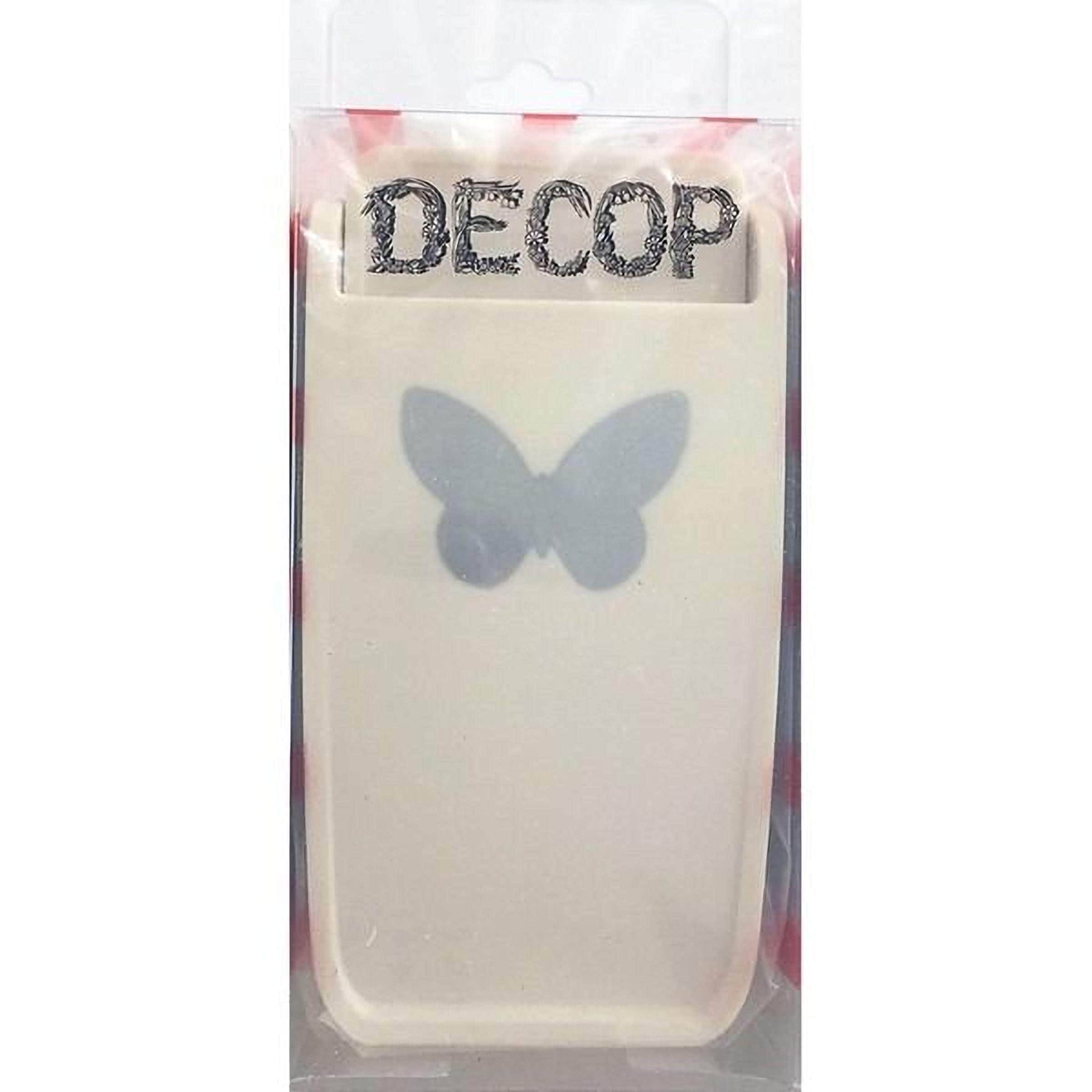 a package containing a white object with a butterfly design on it.