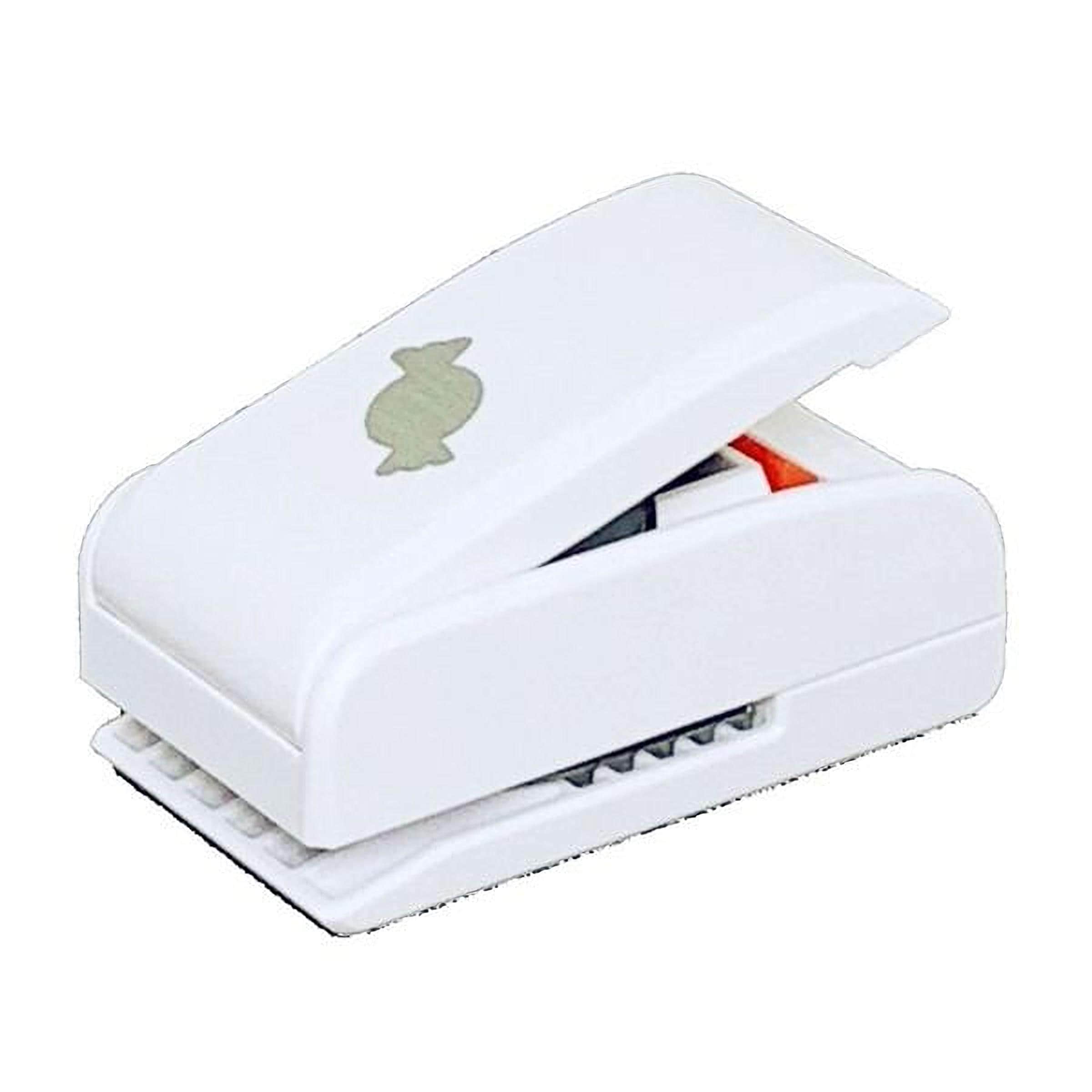 A white plastic hole puncher with a green logo on it.