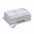 A white, rectangular object with a black geometric design on it.
