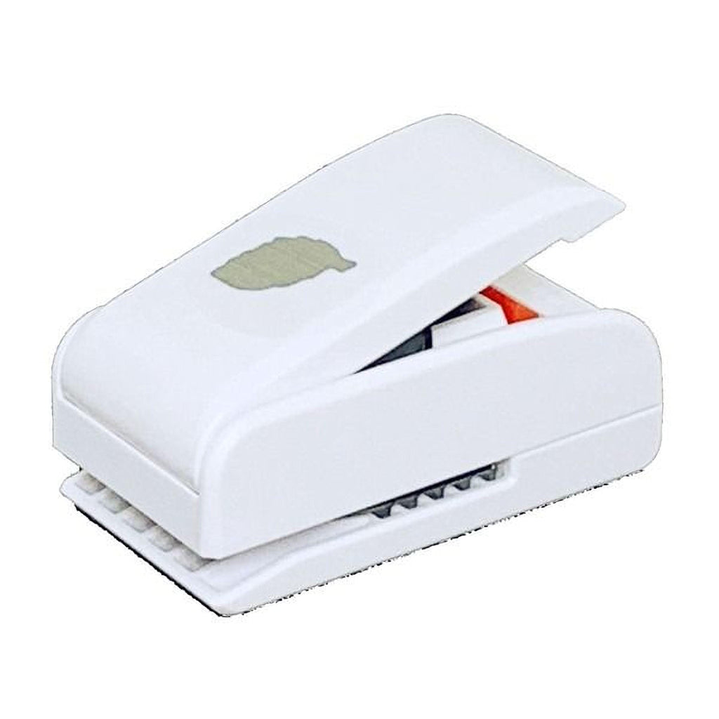 A white, rectangular paper stapler with a green leaf design on the top.
