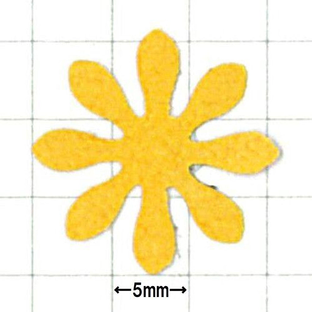 A yellow flower-shaped object with six petals, measuring 5 millimeters in size.