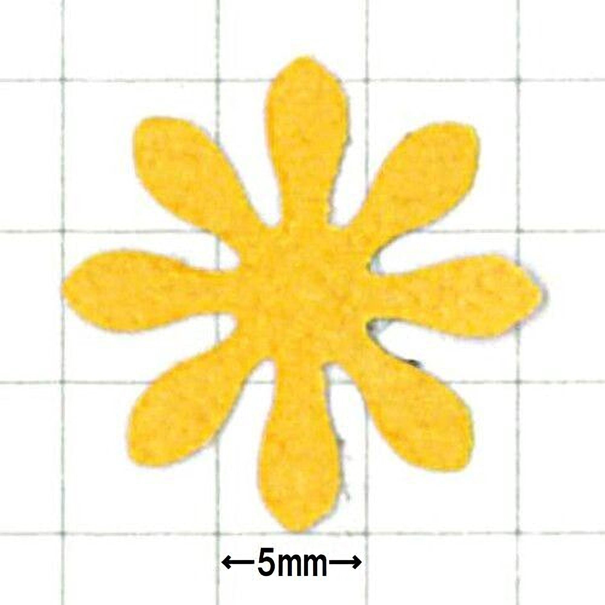 A yellow flower-shaped object with six petals, measuring 5 millimeters in size.