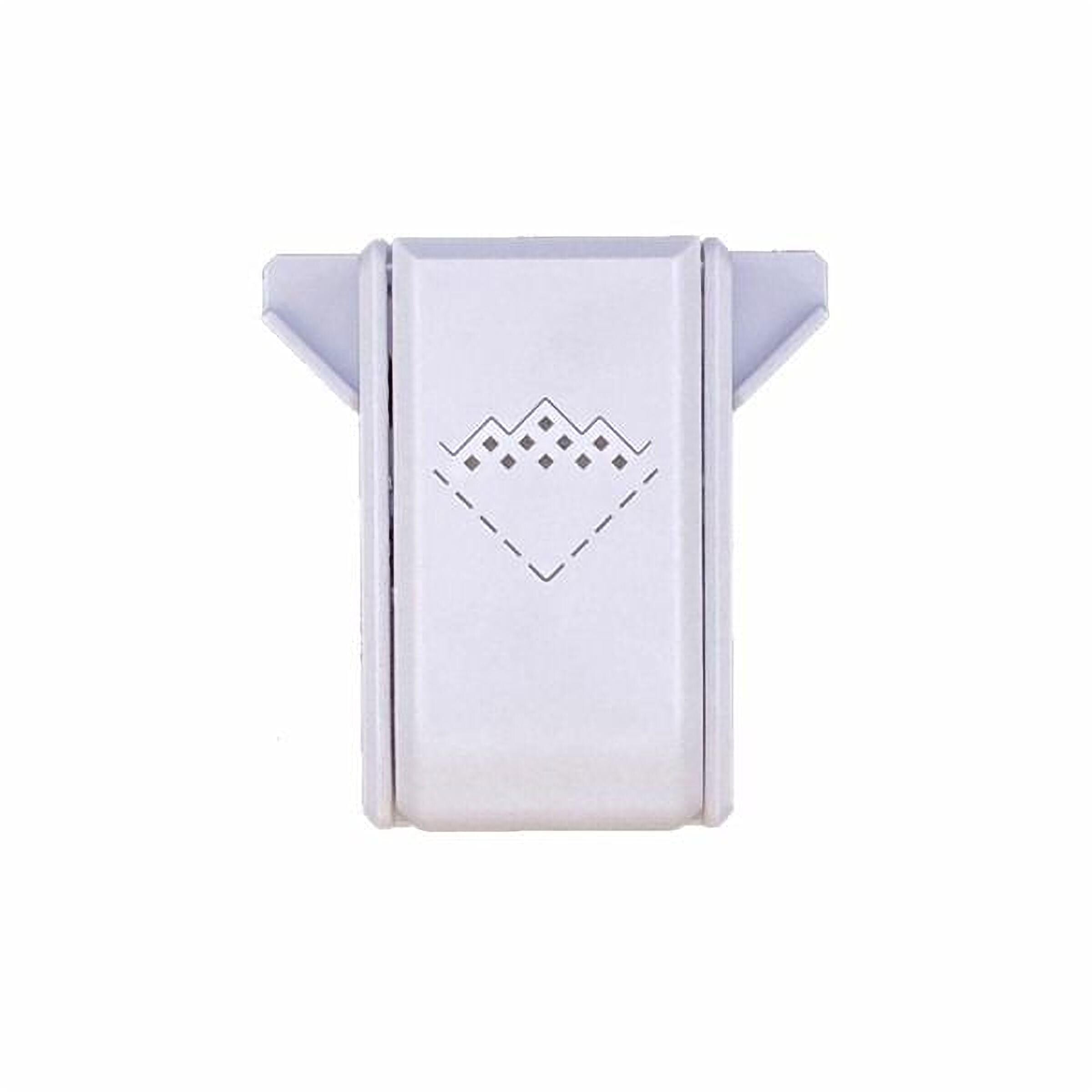 A white rectangular object with a diamond-shaped design on it.