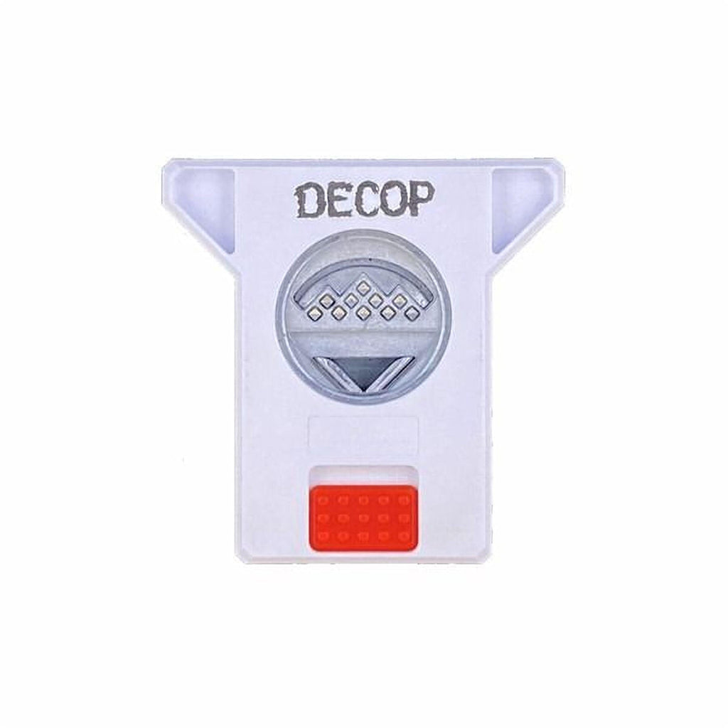 a white plastic device with a red button and the word "DECOP" printed on it.