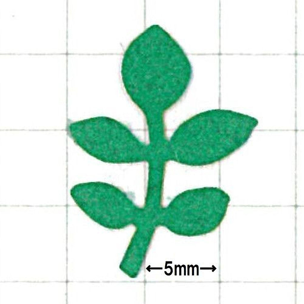 A green leaf-shaped object is shown against a grid background, with a measurement scale indicating it is 5 millimeters in size.