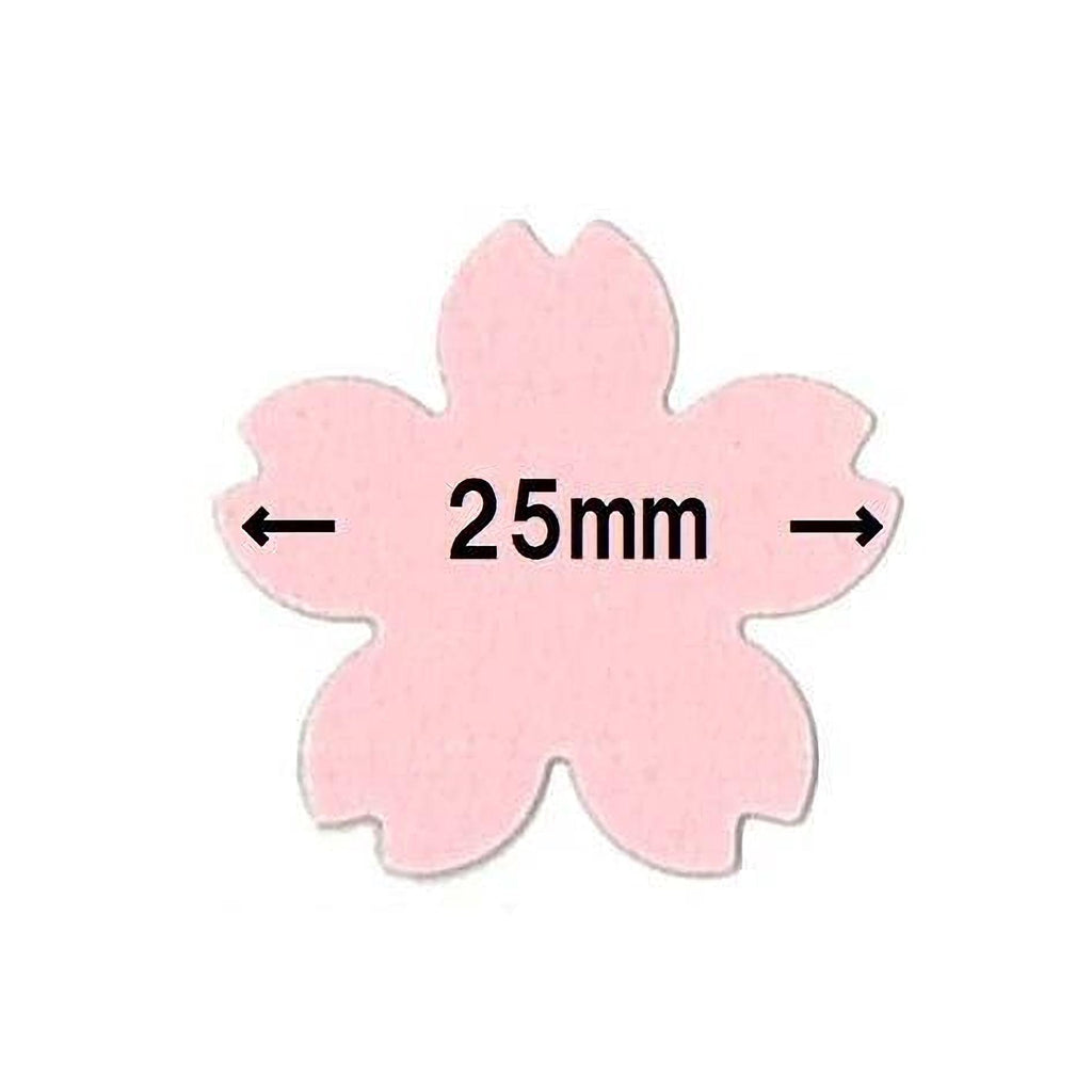 A pink flower-shaped object with the text "25mm" written on it.