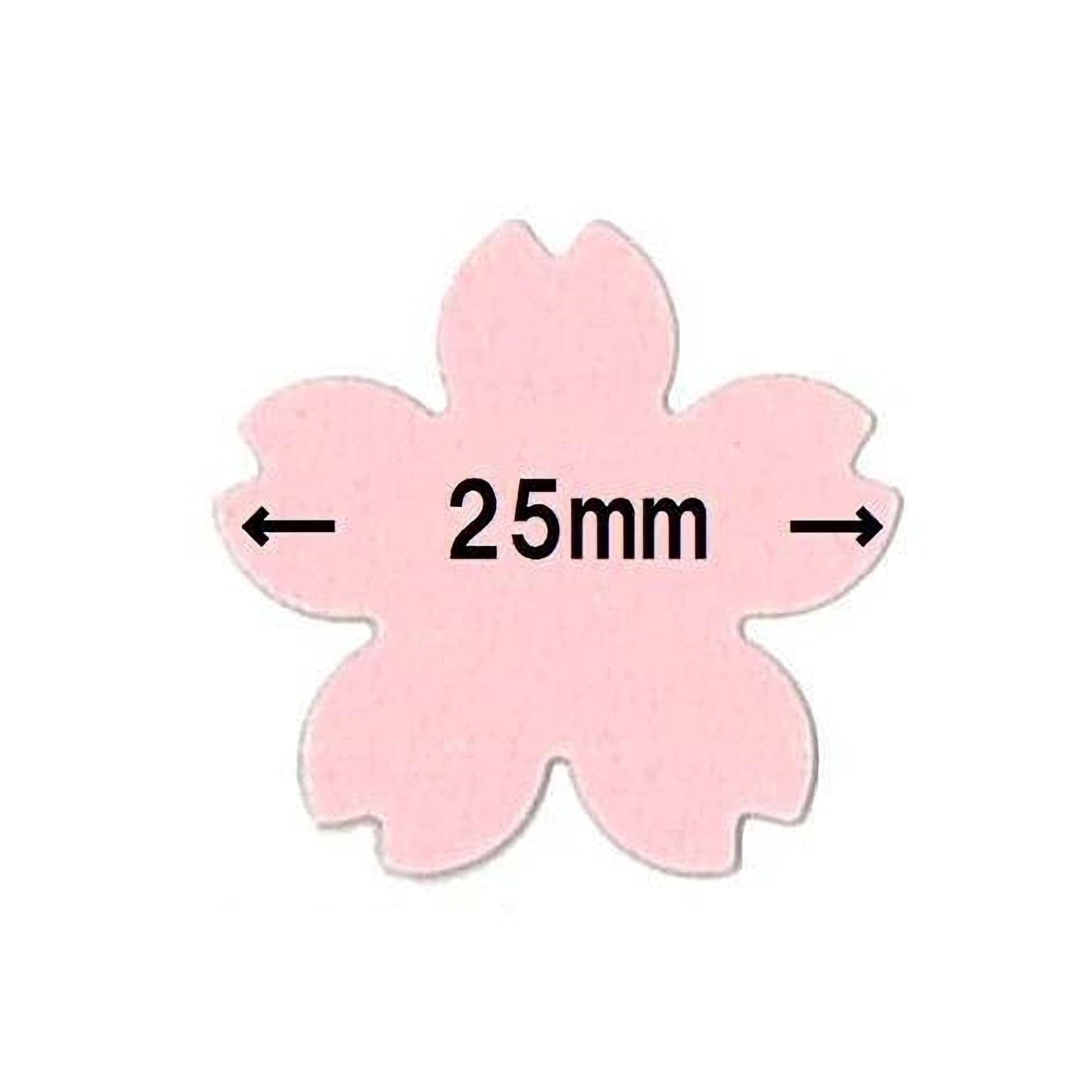 A pink flower-shaped object with the text "25mm" written on it.