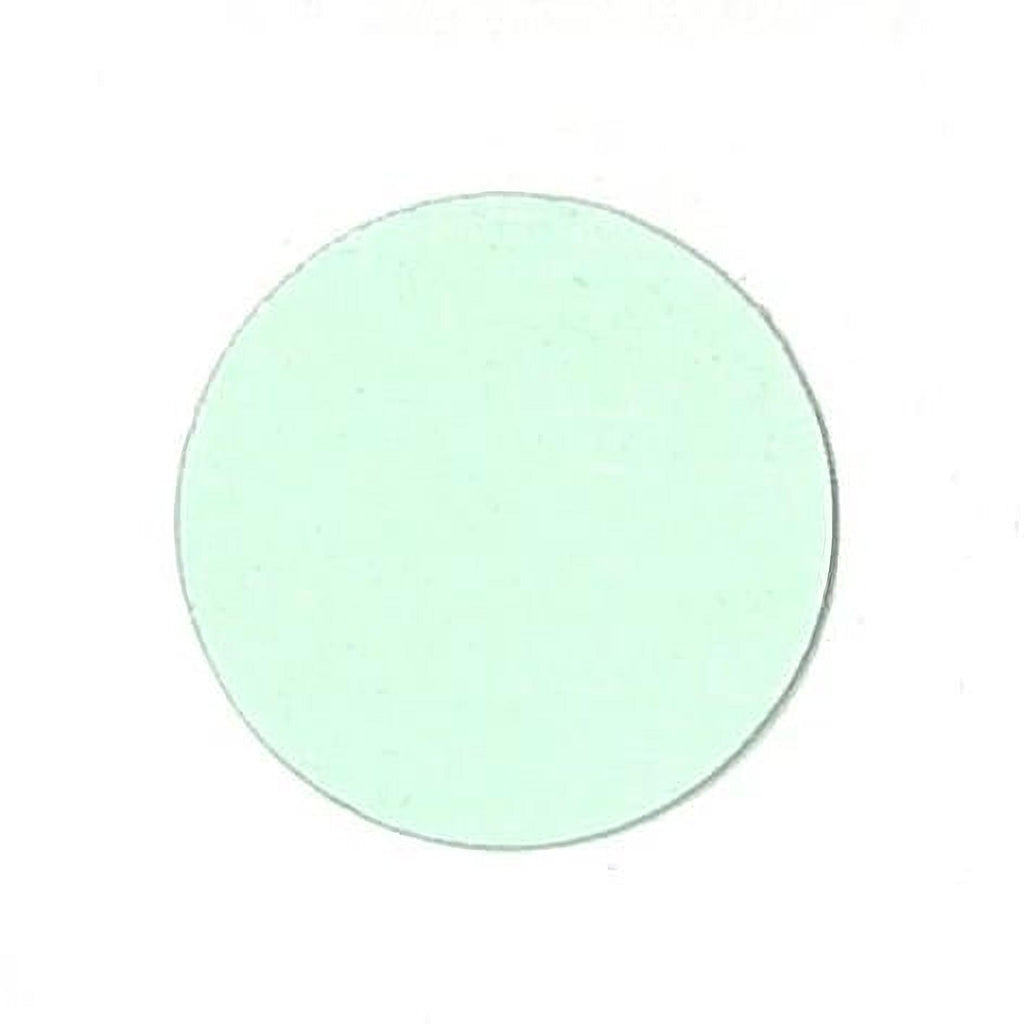 A light green circular object is shown against a white background.
