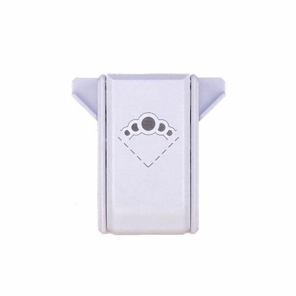 A white, rectangular object with a circular design on it.