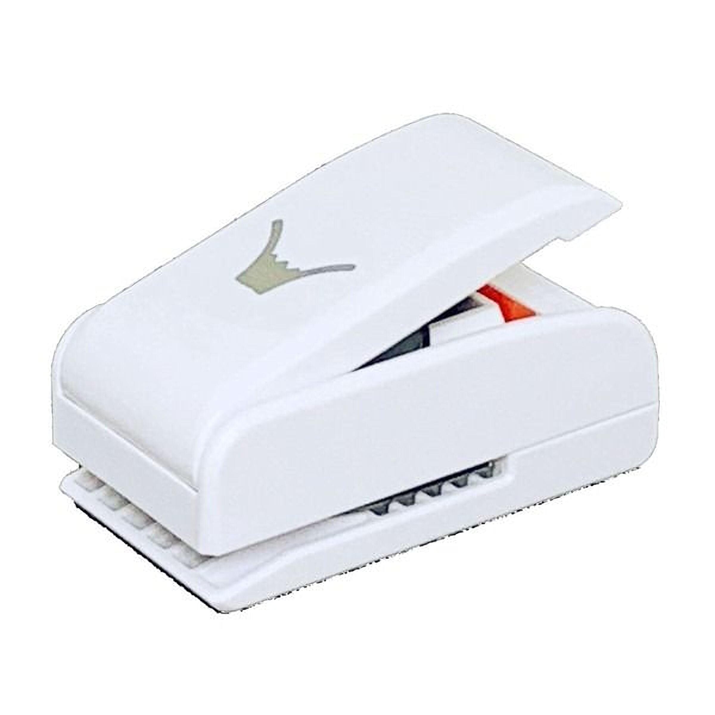 A white, rectangular hole puncher with a logo on it.